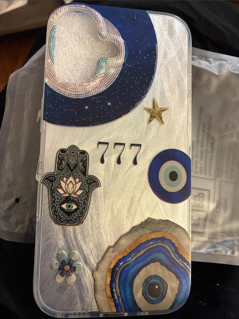 iPhone 16 Decorative Silver Phone Case with Blue Evil Eye and Hamsa Accents
